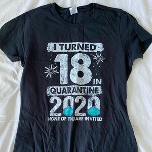 Black "I turned 18 during quarantine" t-shirt.
